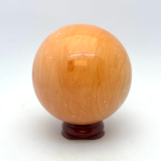 Billede af Orange calcit kugle 6,5 cm